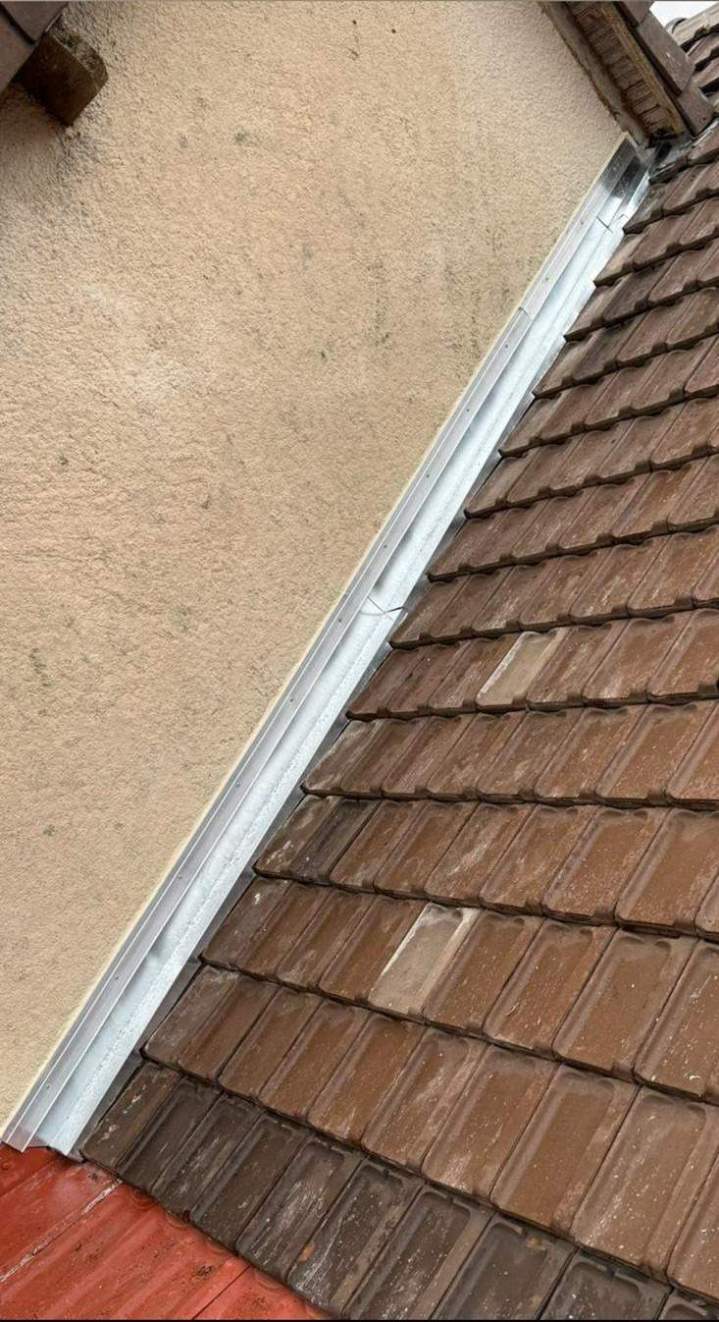 Pose de rive en zinc après